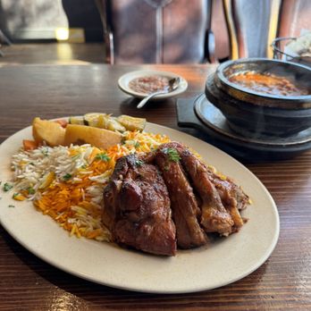 Sheeba Restaurant - West Dearborn - a plate of food on a table - Halal Near Me - Dearborn, Michigan Sheeba Restaurant - West Dearborn - a plate of food on a table - Halal Near Me - Dearborn, Michigan