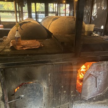 Terry Black's Barbecue - Fires for the smokers - Barbeque Near Me - Austin, Texas Terry Black's Barbecue - Fires for the smokers - Barbeque Near Me - Austin, Texas