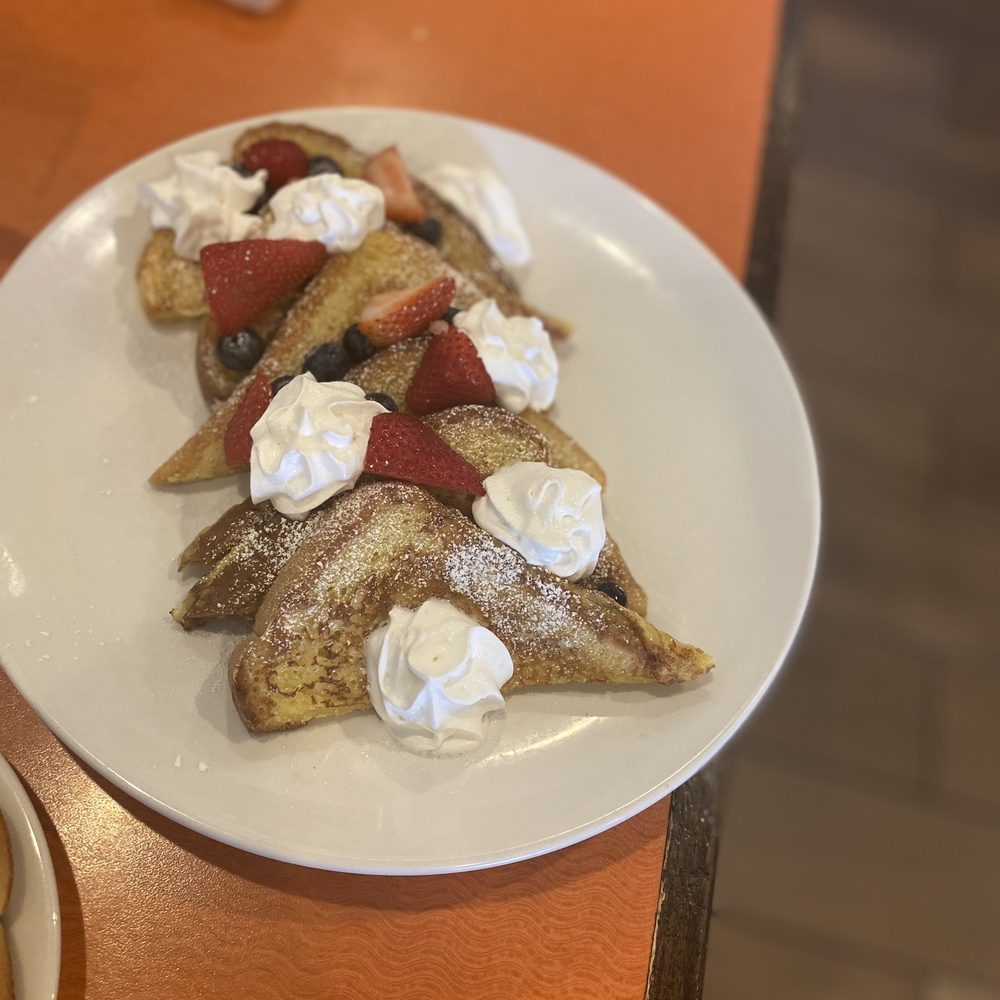Yolkizz Cafe - Berries and cream French toast - Breakfast & Brunch Near Me - Edmond, Oklahoma Yolkizz Cafe - Berries and cream French toast - Breakfast & Brunch Near Me - Edmond, Oklahoma
