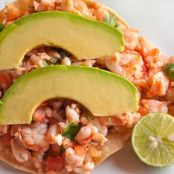 Palenque Grill Loop 20 - Tostada de Ceviche. Shrimp or fish,marinated in lime juice w/tomato, onion, cilantro, served on a corn tostada topped w/avocado