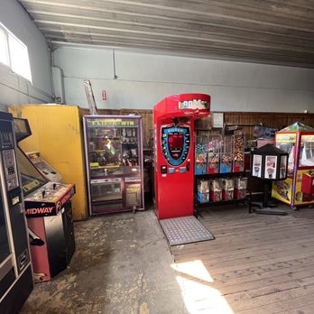 Moon Arcade - Snack machine on left, games, candy, prize, and sticker  machines. - Arcades Near Me - Filer, Idaho