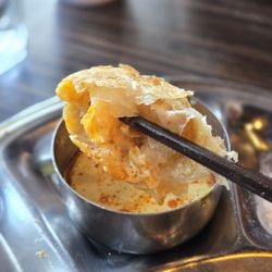 John 3:16 Malaysian Delights - Roti dipped in curry