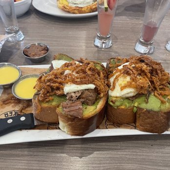 Hash Kitchen - Avocado toast: pork, crispy lentils, fried egg and green chili hollandaise. Also comes with bacon jam and bacon but I got on the side. - Breakfast & Brunch Near Me - Scottsdale, Arizona Hash Kitchen - Avocado toast: pork, crispy lentils, fried egg and green chili hollandaise. Also comes with bacon jam and bacon but I got on the side. - Breakfast & Brunch Near Me - Scottsdale, Arizona