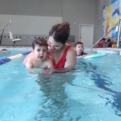 SafeSplash Swim School - Pearland - Parent Tot class in action. The look of serious concentration.