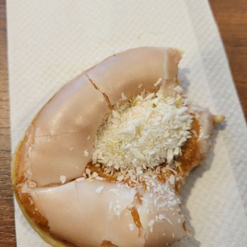 Hoopla Donuts - a half eaten donut on a napkin - Donuts Near Me - Calgary, Alberta Hoopla Donuts - a half eaten donut on a napkin - Donuts Near Me - Calgary, Alberta