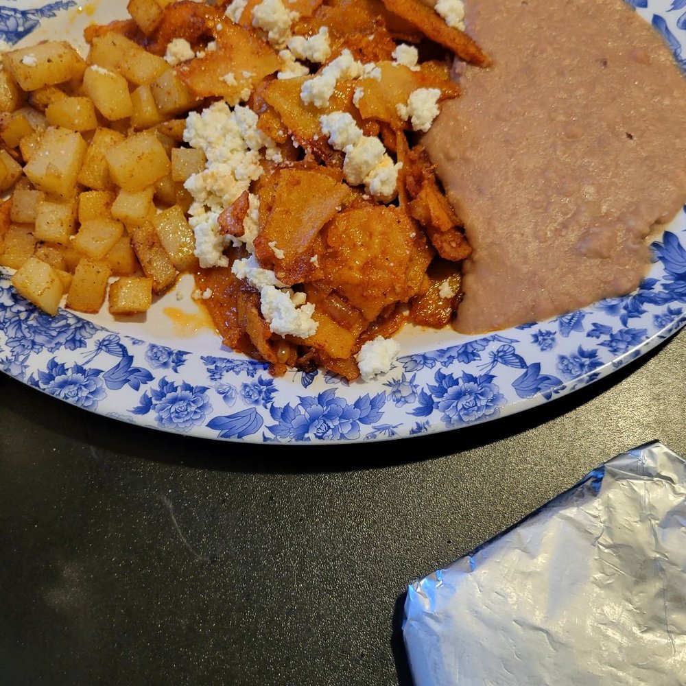 Taqueria San Luis - Chiliquelas (?) eggs mixed w/ tortilla strips topped w/ queso fresco, refried beans, fried taters, & steamed flour or corn tortillas. - Mexican Near Me - Palestine, Texas Taqueria San Luis - Chiliquelas (?) eggs mixed w/ tortilla strips topped w/ queso fresco, refried beans, fried taters, & steamed flour or corn tortillas. - Mexican Near Me - Palestine, Texas