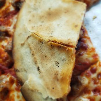 Zaffiro's Pizza - Cracker crust up close - Pizza Near Me - Milwaukee, Wisconsin Zaffiro's Pizza - Cracker crust up close - Pizza Near Me - Milwaukee, Wisconsin