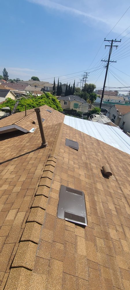 Slide of Rescue Roofing Construction