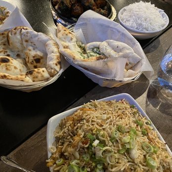 The Himalayan Flames - Foreground is Bhaktapuri chicken fried rice, plain Naan & Garlic Naan, Tandoori quadruple play w/rice. - Himalayan/Nepalese Near Me - Dearborn, Michigan The Himalayan Flames - Foreground is Bhaktapuri chicken fried rice, plain Naan & Garlic Naan, Tandoori quadruple play w/rice. - Himalayan/Nepalese Near Me - Dearborn, Michigan