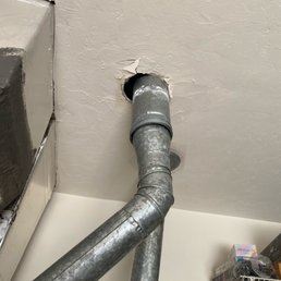 AC ventilation pipe after they "fixed" it.