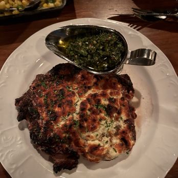 Herbs & Rye - Ribeye (18oz) with Peruvian Chimichurri and Blue Cheese Crust - Steakhouses Near Me - Las Vegas, Nevada Herbs & Rye - Ribeye (18oz) with Peruvian Chimichurri and Blue Cheese Crust - Steakhouses Near Me - Las Vegas, Nevada