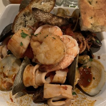 Nostrano Italian Eatery - Cioppino. The 2 shrimp and 2 scallops were the meatiest thing. Everything else was what you see - Italian Near Me - Newtown, Connecticut Nostrano Italian Eatery - Cioppino. The 2 shrimp and 2 scallops were the meatiest thing. Everything else was what you see - Italian Near Me - Newtown, Connecticut
