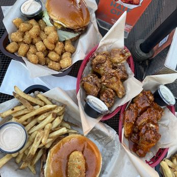 Dusty’s Hideaway - Dusty's Burger, Smokestack Burger, The Murf Burger, Chicken Wings (honey garlic- left and mango habanero-right) - Burgers Near Me - Tacoma, Washington Dusty’s Hideaway - Dusty's Burger, Smokestack Burger, The Murf Burger, Chicken Wings (honey garlic- left and mango habanero-right) - Burgers Near Me - Tacoma, Washington