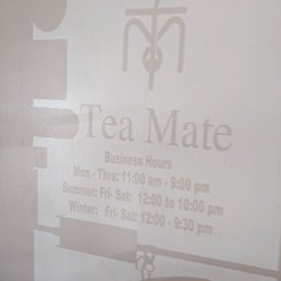Shadow of door signage on wall