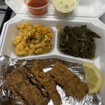 Vibrations Vegan Wellness Cafe - Vegan fish (heart of palm), mac n cheese, greens, Frank's hot sauce, and a vegan homemade tartar sauce. - Vegan Near Me - Waukee, Iowa Vibrations Vegan Wellness Cafe - Vegan fish (heart of palm), mac n cheese, greens, Frank's hot sauce, and a vegan homemade tartar sauce. - Vegan Near Me - Waukee, Iowa