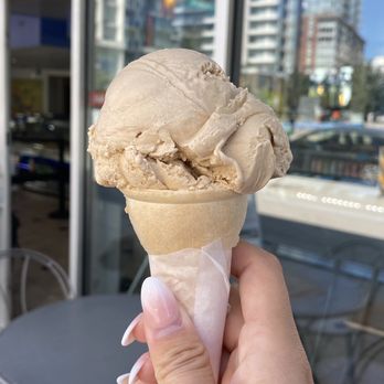 Amato Gelato Cafe - a hand holding an ice cream cone - Ice Cream & Frozen Yogurt Near Me - Vancouver, British Columbia Amato Gelato Cafe - a hand holding an ice cream cone - Ice Cream & Frozen Yogurt Near Me - Vancouver, British Columbia