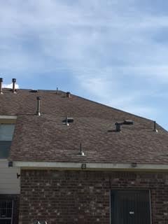 Slide of Coat of Arms Roofing