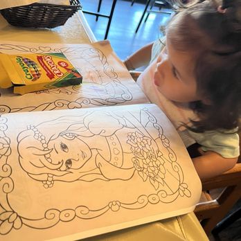Erio's Ristorante - Daughter adding her art to the Erio's coloring book. - Italian Near Me - Saint Peters, Missouri Erio's Ristorante - Daughter adding her art to the Erio's coloring book. - Italian Near Me - Saint Peters, Missouri