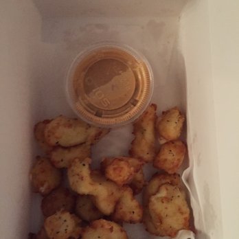 AJ Bombers - This is a "full order" of cheese curds in the box for delivery. - Burgers Near Me - Milwaukee, Wisconsin AJ Bombers - This is a "full order" of cheese curds in the box for delivery. - Burgers Near Me - Milwaukee, Wisconsin