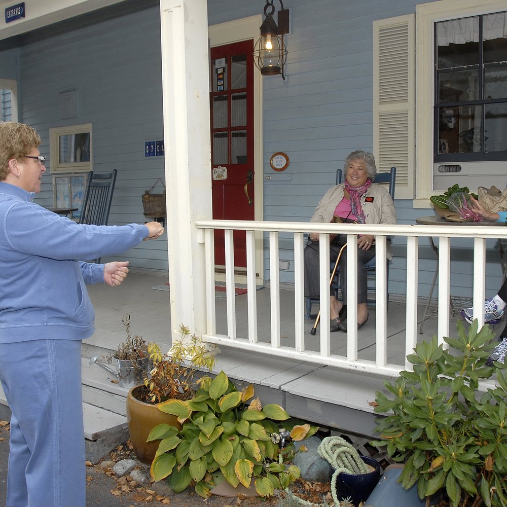 Blue Harbor House - chatting with other guests on the porch at the great Blue Harbor House. - Bed & Breakfast Near Me - Camden, Maine Blue Harbor House - chatting with other guests on the porch at the great Blue Harbor House. - Bed & Breakfast Near Me - Camden, Maine
