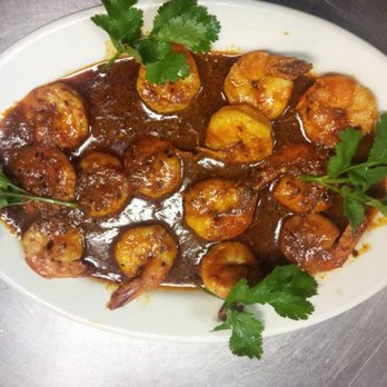 Los Faroles - a plate of food with meat and vegetables - Mexican Near Me - Houston, Texas Los Faroles - a plate of food with meat and vegetables - Mexican Near Me - Houston, Texas