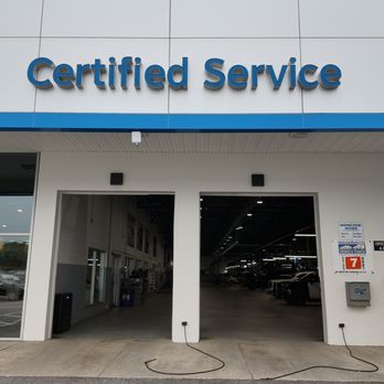 Quirk Chevrolet - Quirk Chevrolet's certified service center exterior entrance and open service bays. - Car Dealers Near Me - Braintree, Massachusetts Quirk Chevrolet - Quirk Chevrolet's certified service center exterior entrance and open service bays. - Car Dealers Near Me - Braintree, Massachusetts