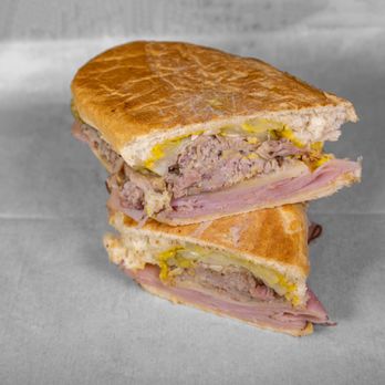 Home Team Deli - #9 "The Cuban Comet" Cuban Press - Mojo Pork, Grilled Ham, Swiss, Onions, Pickles & Mustard all Pressed & Melted on Italian - Delis Near Me - Denver, Colorado Home Team Deli - #9 "The Cuban Comet" Cuban Press - Mojo Pork, Grilled Ham, Swiss, Onions, Pickles & Mustard all Pressed & Melted on Italian - Delis Near Me - Denver, Colorado