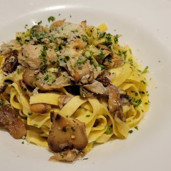 Mille Pâtes - a plate of pasta with mushrooms - Italian Near Me - Mont-Tremblant, Quebec Mille Pâtes - a plate of pasta with mushrooms - Italian Near Me - Mont-Tremblant, Quebec