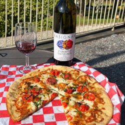 Basignani Winery - Special Margherita Pizza with fresh basil and heirloom tomatoes. Crispy and garlicky with lots of olive oil. Cabernet Sauvignon.