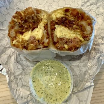 LJ's Lil' Cafe - Stuffed at the perfect ratio | OG breakfast burrito and creamy cilantro crema - Breakfast & Brunch Near Me - Orange, California