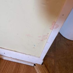 Dunes Realty Inc - Vacation Rentals - Stain on wall near kitchen.