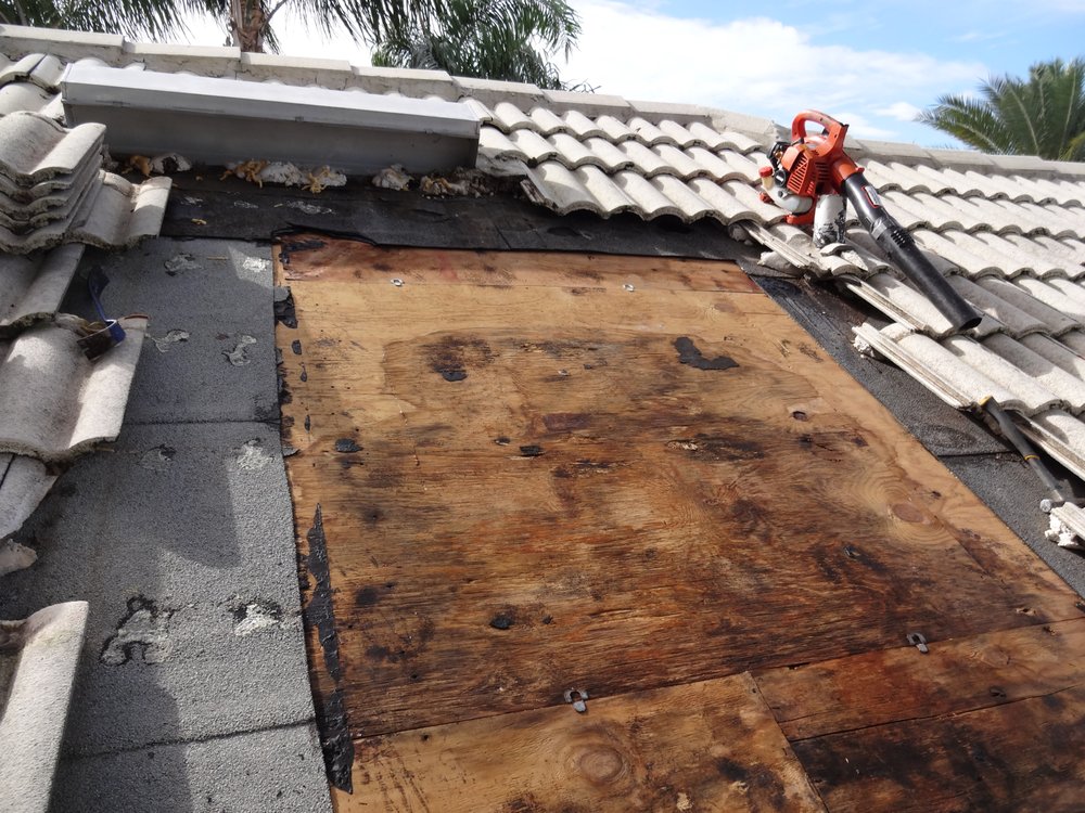 Slide of Coastal Roofing