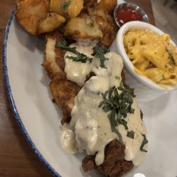 Tupelo Honey Southern Kitchen & Bar - Smothered Chicken* - Southern Near Me - Arlington, Virginia Tupelo Honey Southern Kitchen & Bar - Smothered Chicken* - Southern Near Me - Arlington, Virginia