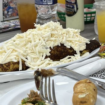 Sabor Venezolano Atlanta - a plate of food on a table - Venezuelan Near Me - Alpharetta, Georgia Sabor Venezolano Atlanta - a plate of food on a table - Venezuelan Near Me - Alpharetta, Georgia