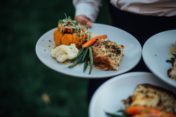 Photo of Vintage Press - Visalia, CA, US. a person holding plates of food