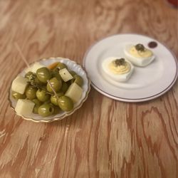Frenchish - citrus and thyme marinated olives with manchego & devilish egg