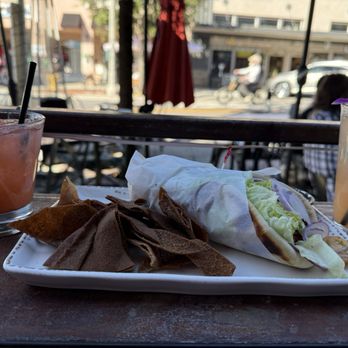 Curbside Eatery & Drinkery - Falafel wrap with pita chips coupled with the rose and pink cactus cocktails. - New American Near Me - La Mesa, California