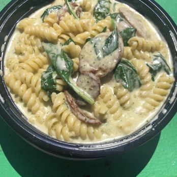 Pastability's - Rotini with basil pesto, spinach, and spicy Italian sausage. - Italian Near Me - Salinas, California Pastability's - Rotini with basil pesto, spinach, and spicy Italian sausage. - Italian Near Me - Salinas, California