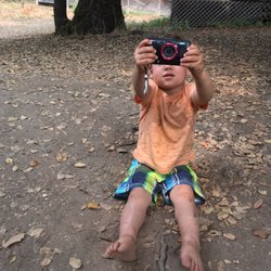 Mountain Home Ranch - Playing in dirt in front of the cabin