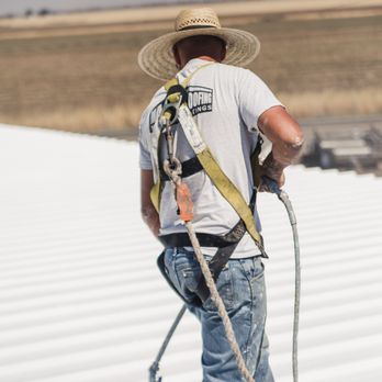 Mast Roofing - Spraying a roof in Chico, California - Roofing Near Me - Redding, California