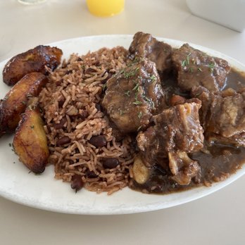 Mad Cow Grill - Rice and Peas Unforgettable Braised Oxtails definitely not forgettable with what was found in it - American Near Me - Laurel, Maryland