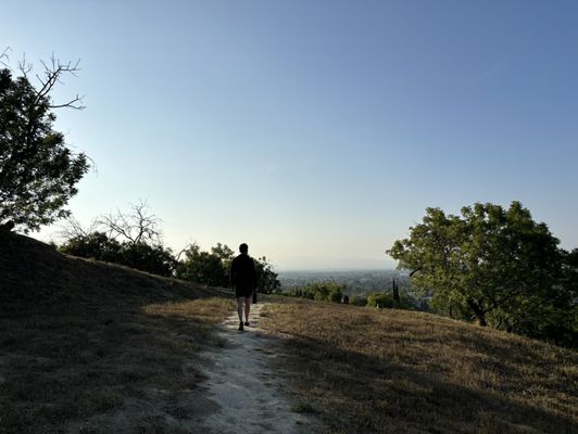 A hillside trail and Valley view at Deervale–Stone Canyon Park