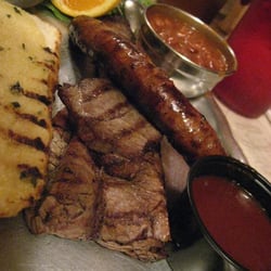 Sliced beef and hot link.