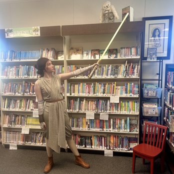 Princess Quinlin Parties - Pointing out good books. - Party Characters Near Me Princess Quinlin Parties - Pointing out good books. - Party Characters Near Me