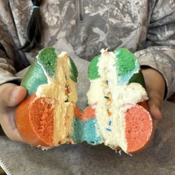 NYC Bagel and Deli - Rainbow Bagel with birthday cake cream cheese - Delis Near Me - Mckinney, Texas NYC Bagel and Deli - Rainbow Bagel with birthday cake cream cheese - Delis Near Me - Mckinney, Texas