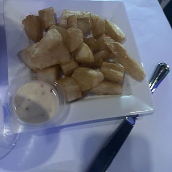 Made In Puerto Rico - Yucca fries with garlic sauce! Delicious - Latin American Near Me - Orlando, Florida Made In Puerto Rico - Yucca fries with garlic sauce! Delicious - Latin American Near Me - Orlando, Florida