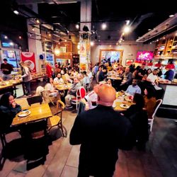 Giorgio Pizza Bar - Triangle Blvd- Damon speaking to all the yelpers about Triangle Resturaunt week.
