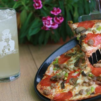 US Pizza - Bryant - a slice of pizza and a drink - Pizza Near Me - Bryant, Arkansas