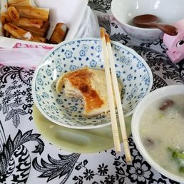 Congee and cheung fun take home. ( please ignore the middle pastry dish ) Congee and cheung fun take home. ( please ignore the middle pastry dish )