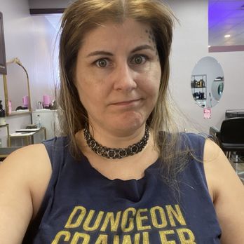 Bombshells Hair Studio - What I came in with - bad orangey color from a box dye. - Hair Salons Near Me - Murfreesboro, Tennessee